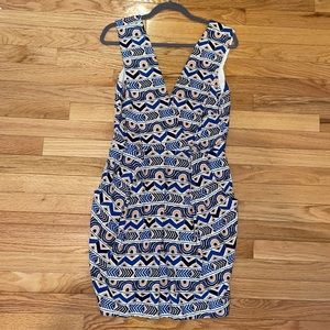 Whit patterned mini dress with front pockets